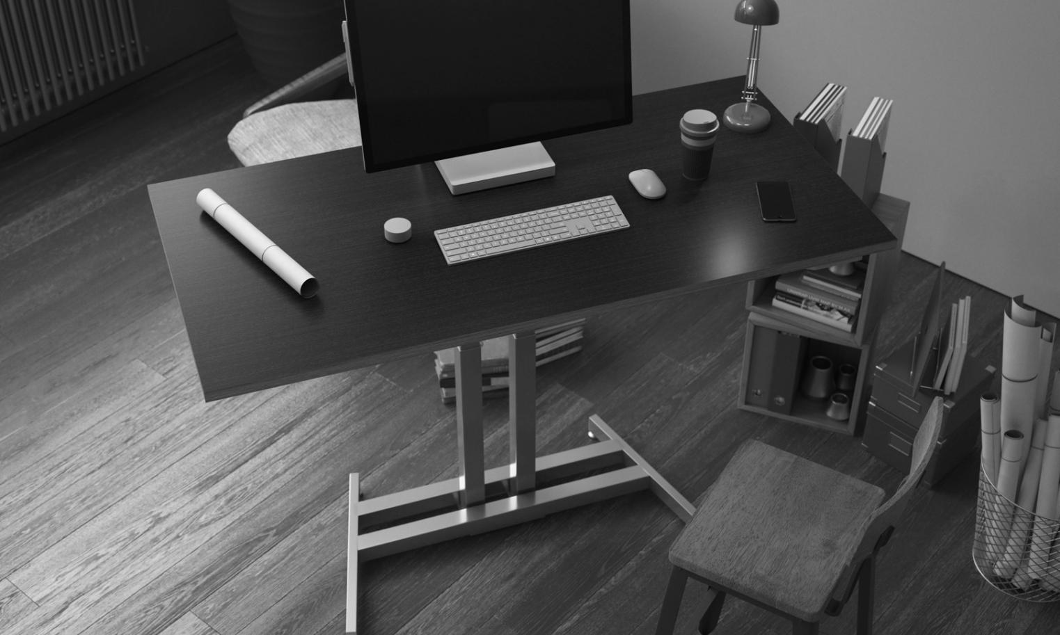 Kreative Arbeitsumgebung mit Laptop und Finanzunterlagen